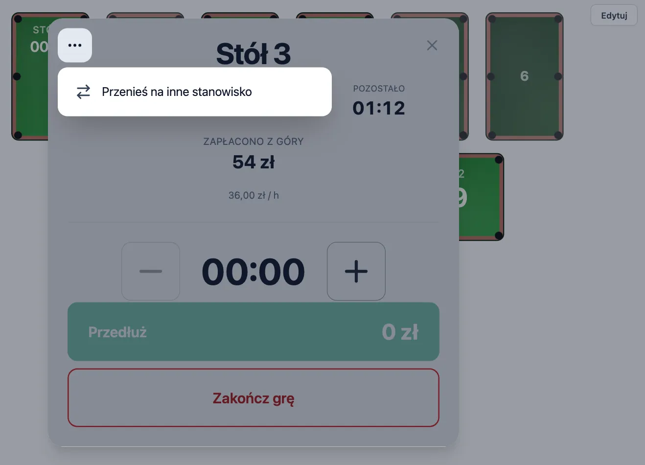 Okno trwającej gry na Stole 3 z otwartym menu pod przyciskiem z trzema kropkami i pozycją Przenieś na inne stanowisko.